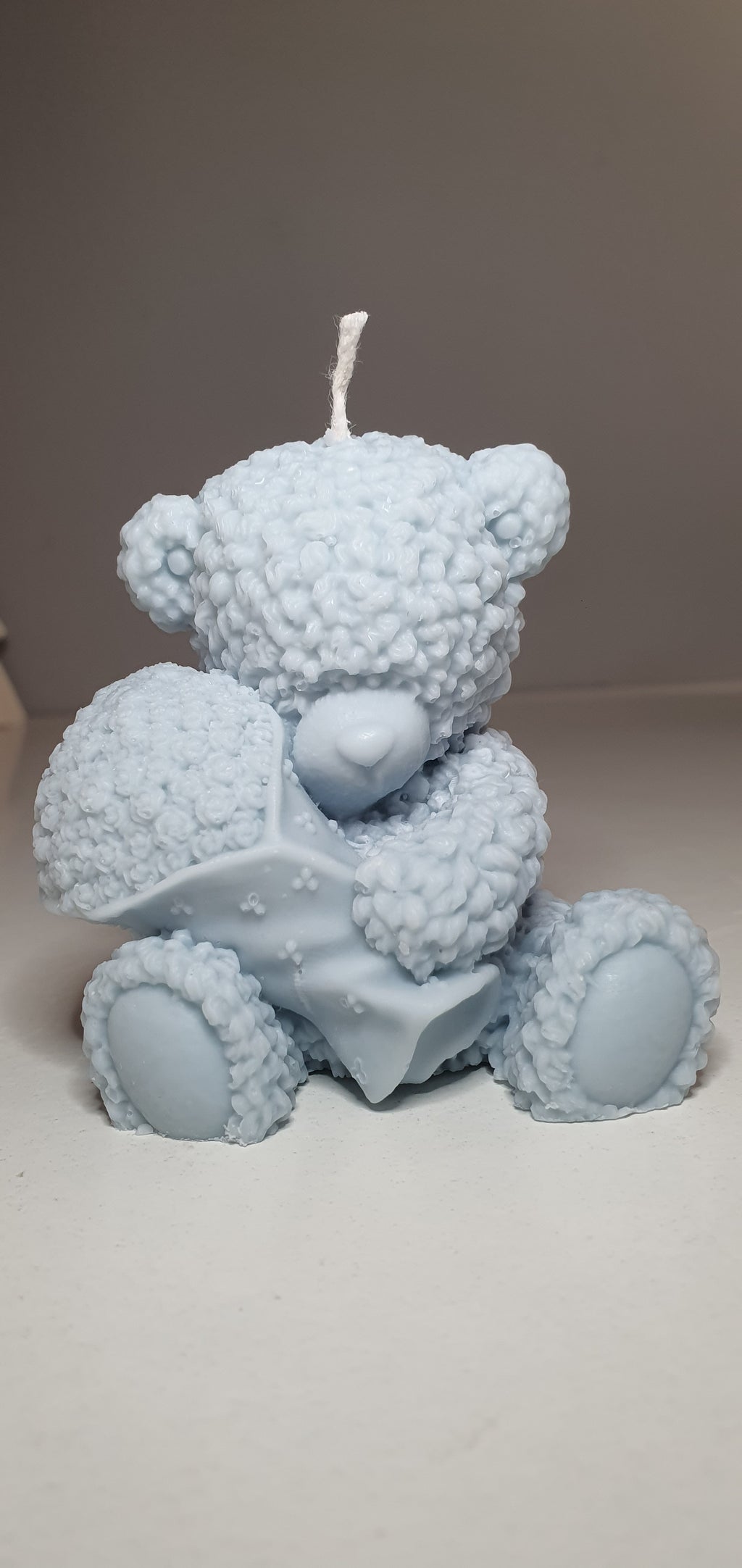 Świeca miś z kwiatami