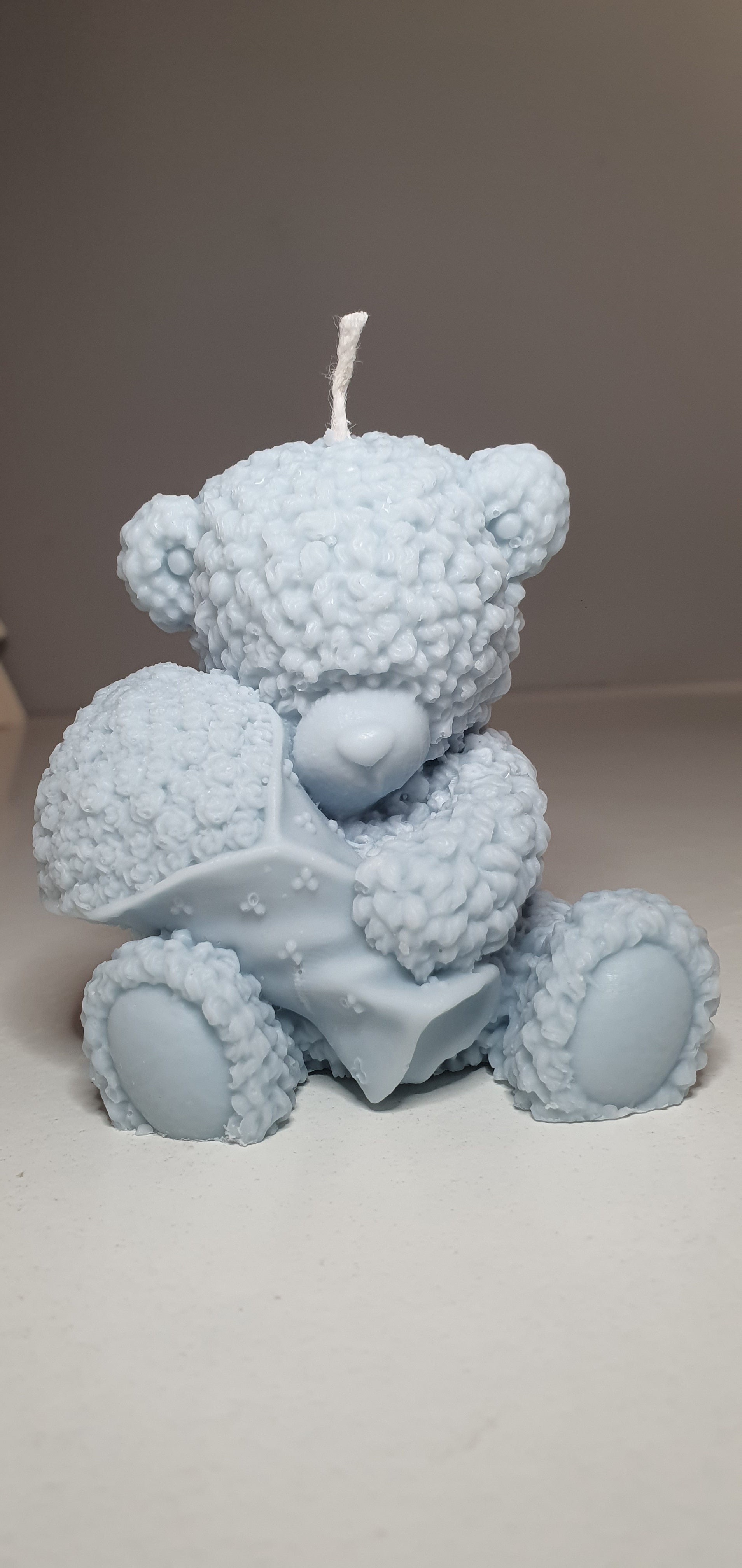 Świeca miś z kwiatami